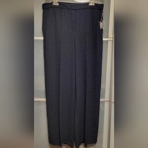 Vince Camuto elegant wide-leg striped pants.